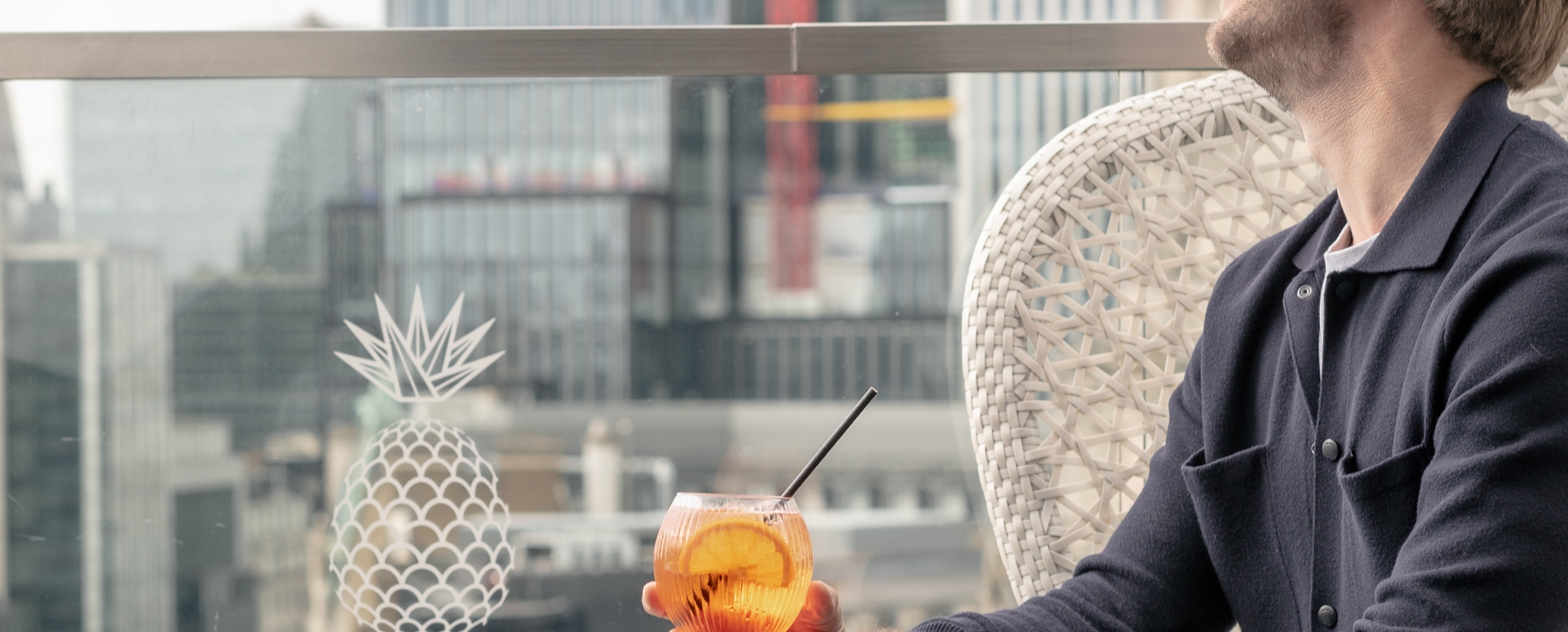 guest enjoying cocktail at Jin Bo Law