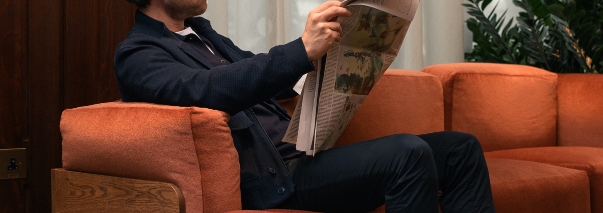 guest reading the newspaper