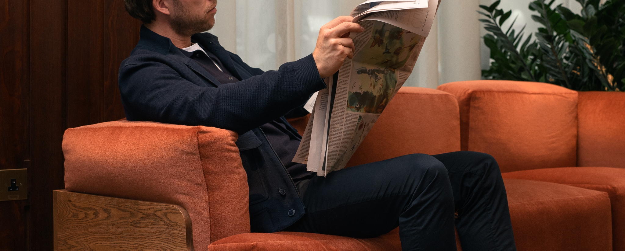 guest reading the newspaper