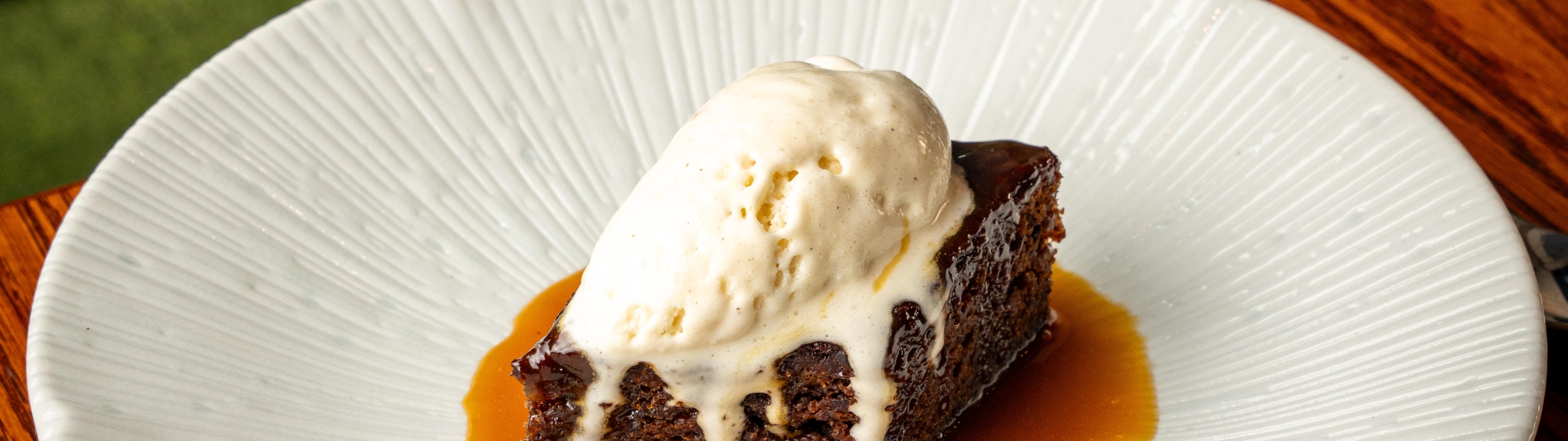 Sticky toffee pudding with ice cream at The Cardinal Bar & Kitchen